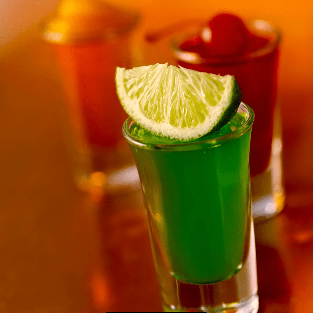 Jello Shots with Vodka topped with a slice of lemon