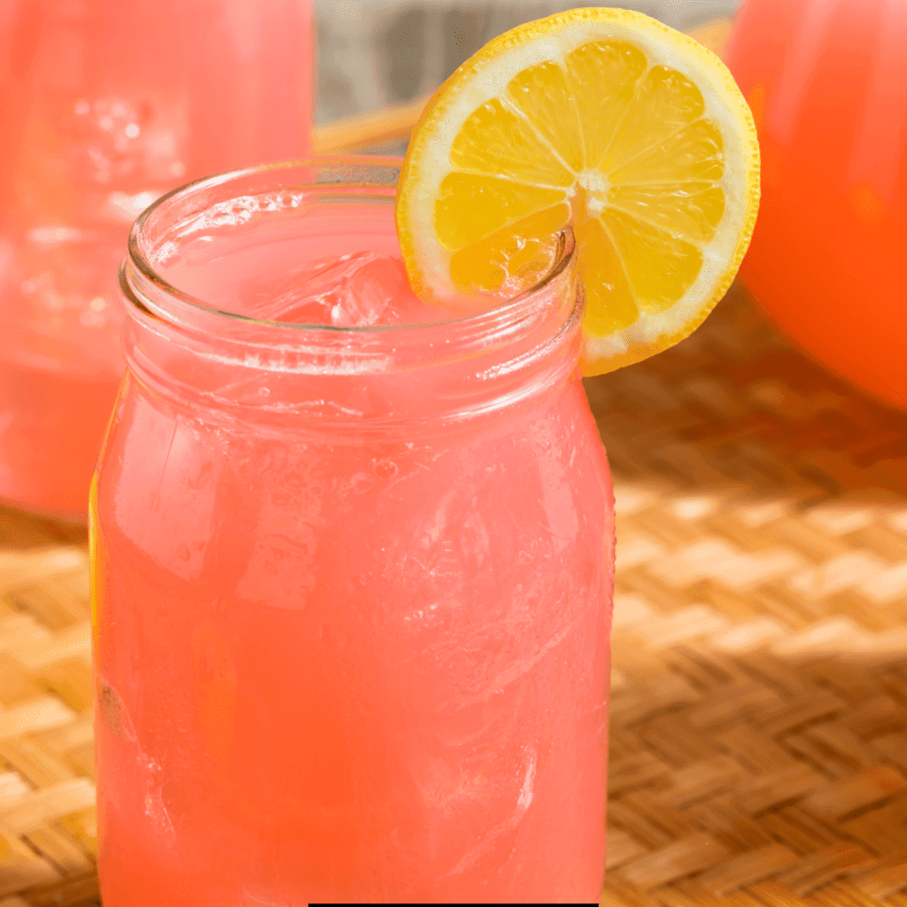 Sutter Home Strawberry Lemonade with a vibrant pink in color and slice of lemon on the rim