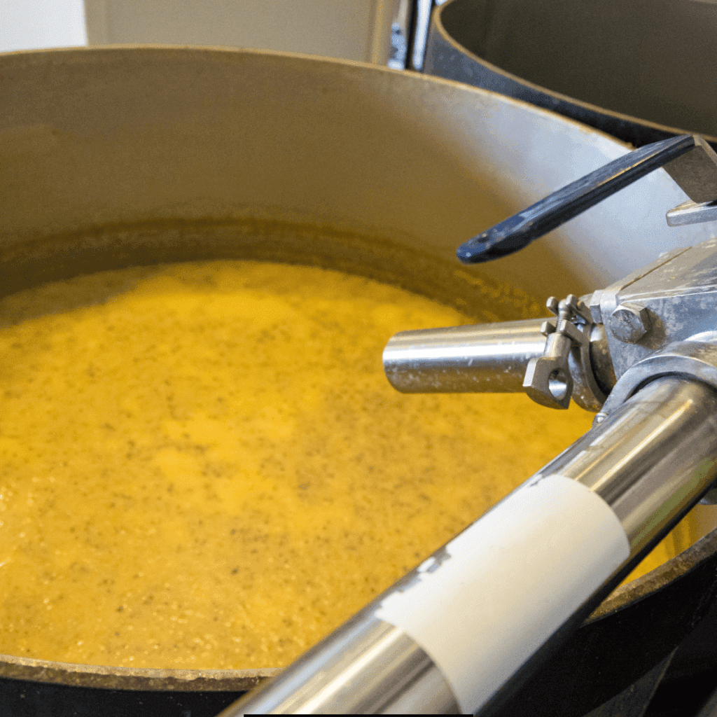 potato in a mash machine to produce vodka