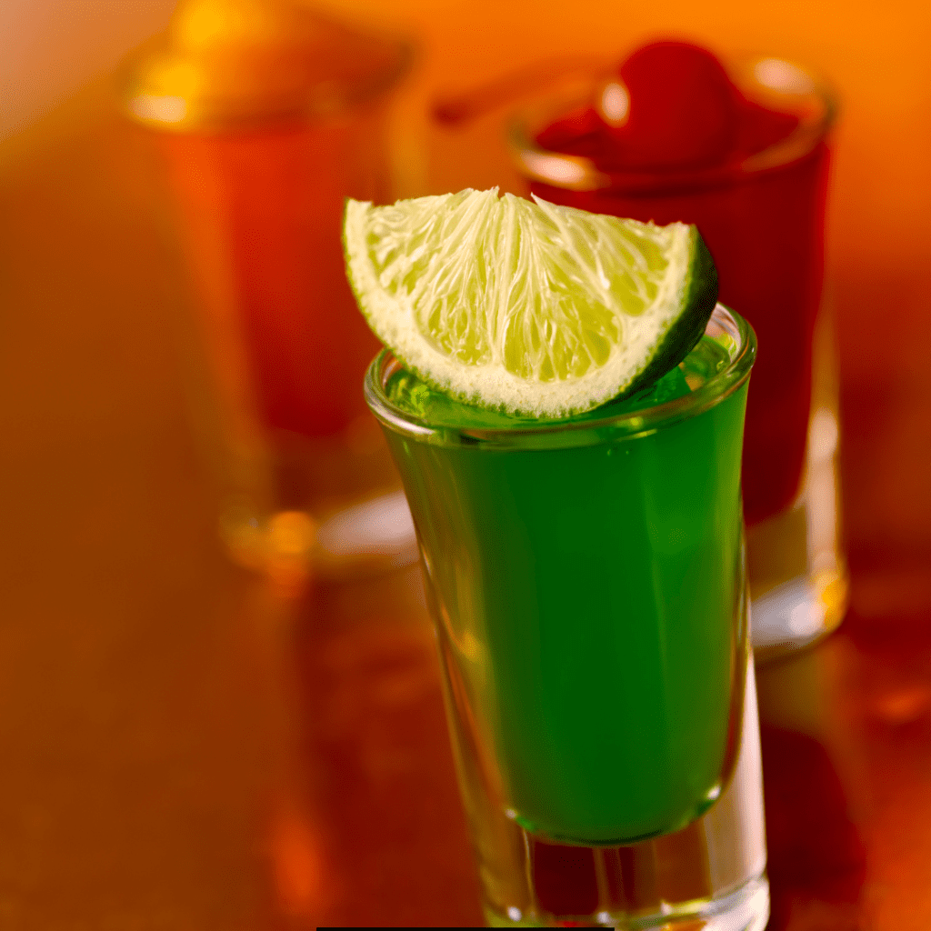 Jello Shots with Vodka topped with a slice of lemon
