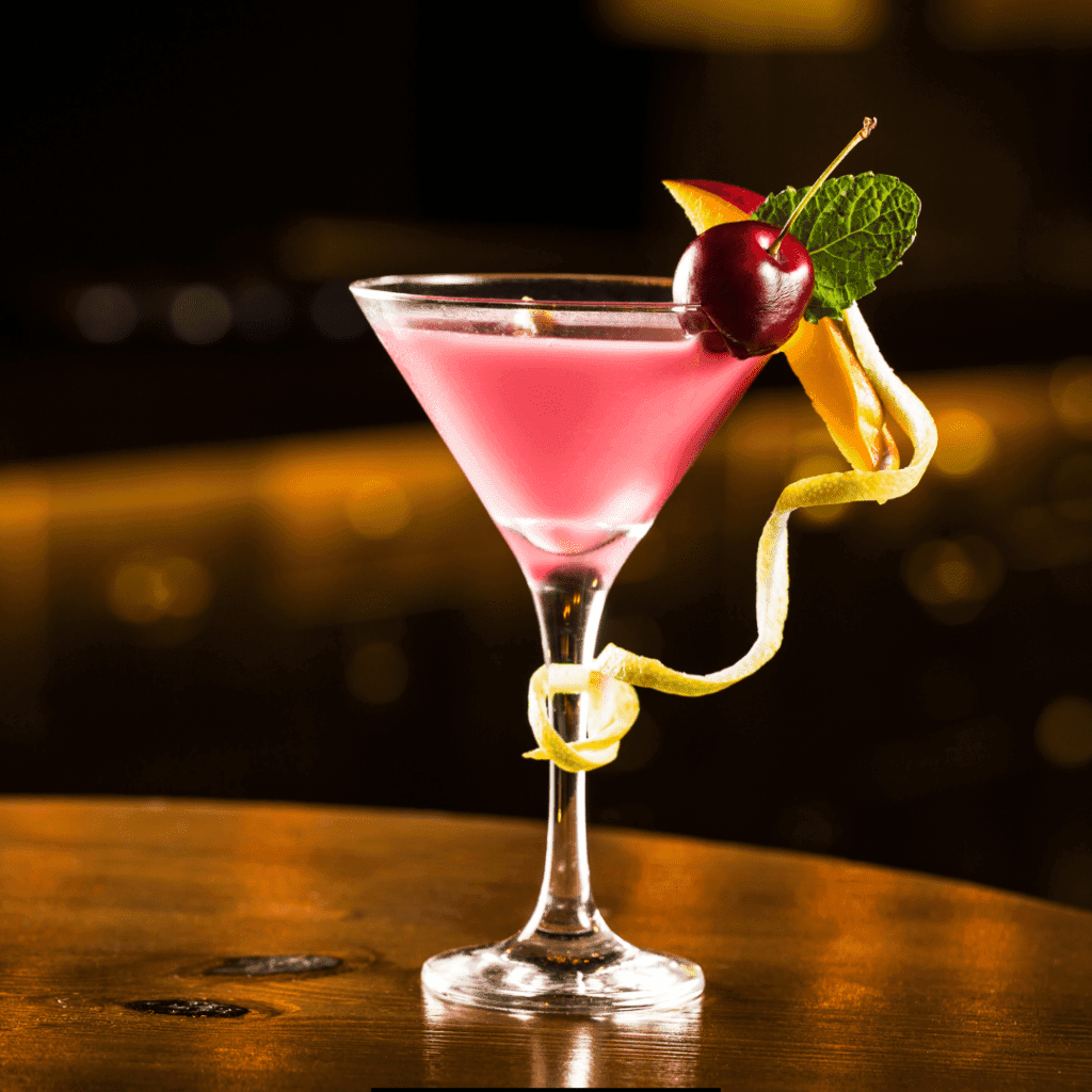 Refreshing US Open Cocktail Recipe garnished with cherry, mint and a slice of apple, best for summer.